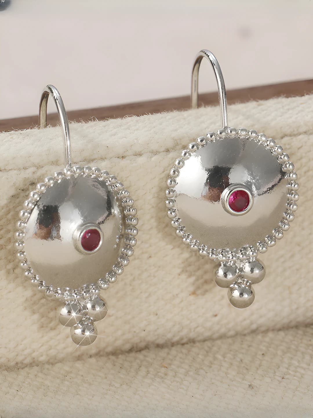 Women's copper earrings with geometric design element in retro style