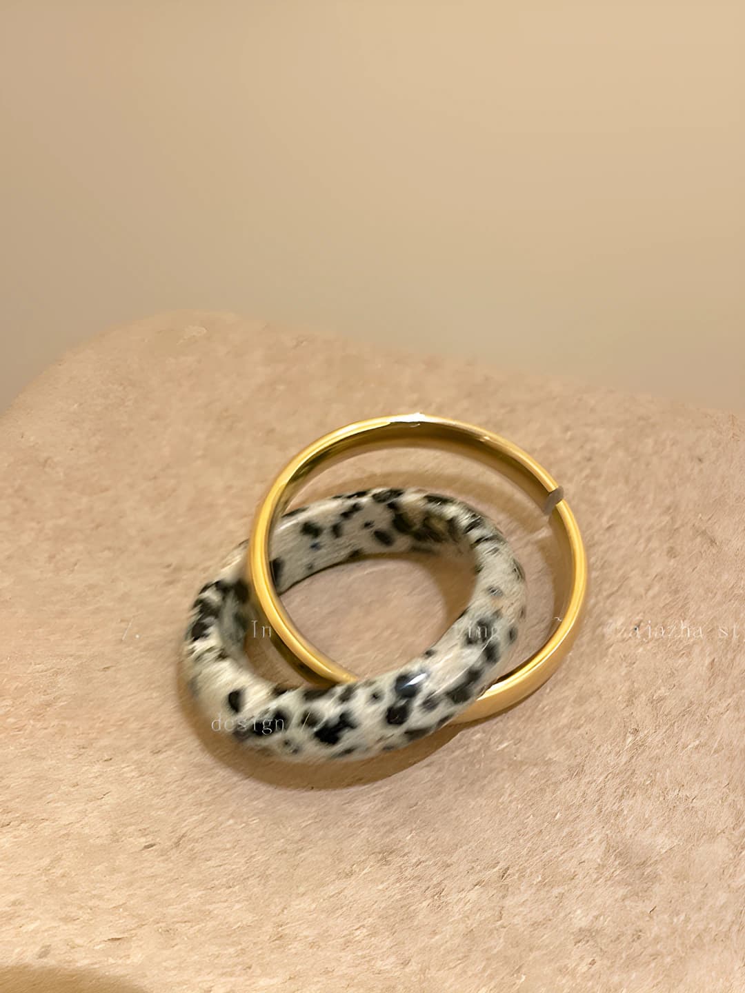 Gold spotted stone ring