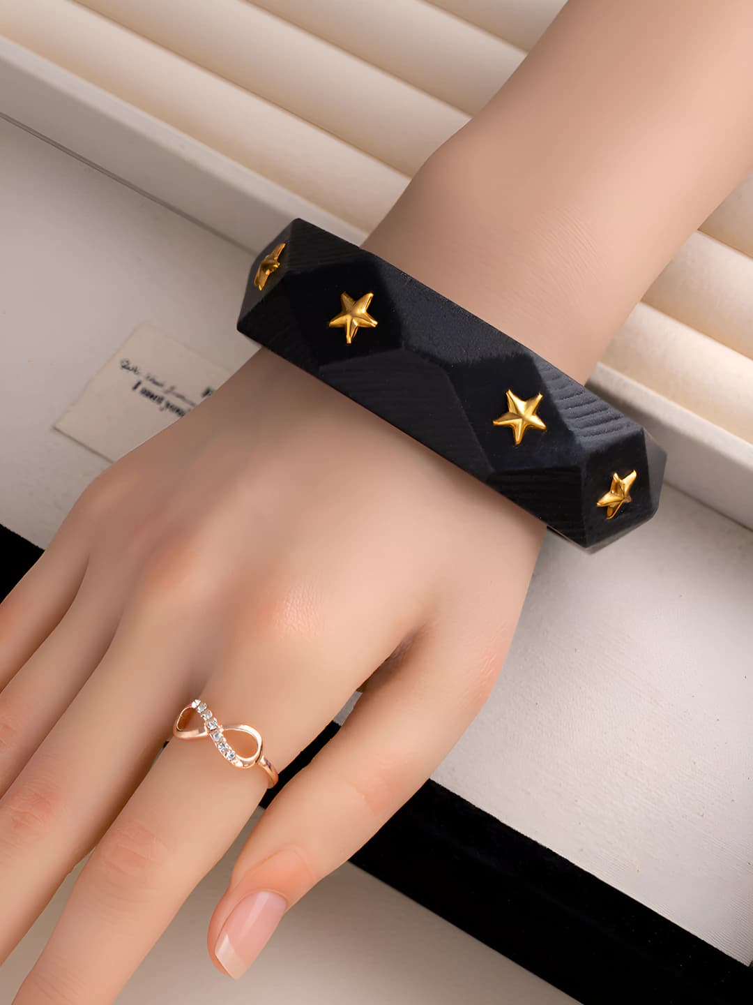 Black (gold star)
