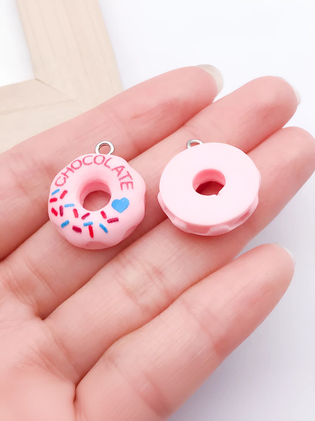 Pink donut 'chocolate', 23x19x7mm
