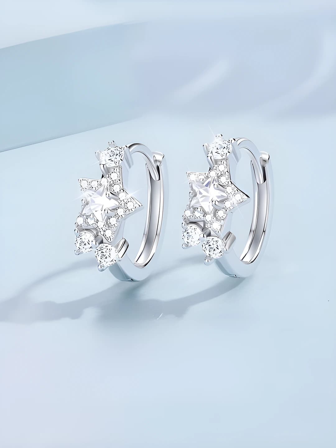 Women's star-shaped hoop earrings with zircon, luxury style, design element