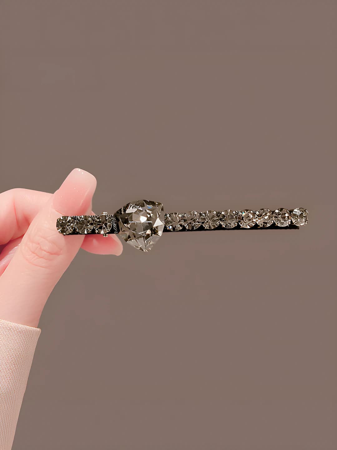 Women's hair clips and combs: hair clip with artificial crystal and rhinestones, featuring a geometric design element, in street style