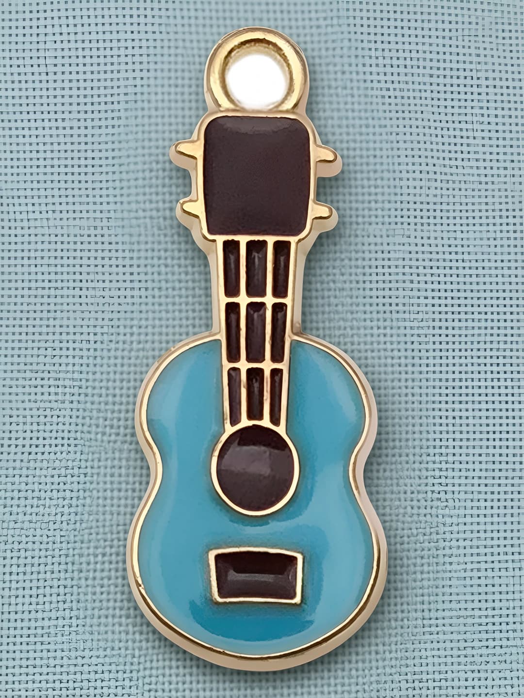 1 ta gitara 23x10mm-0.9g