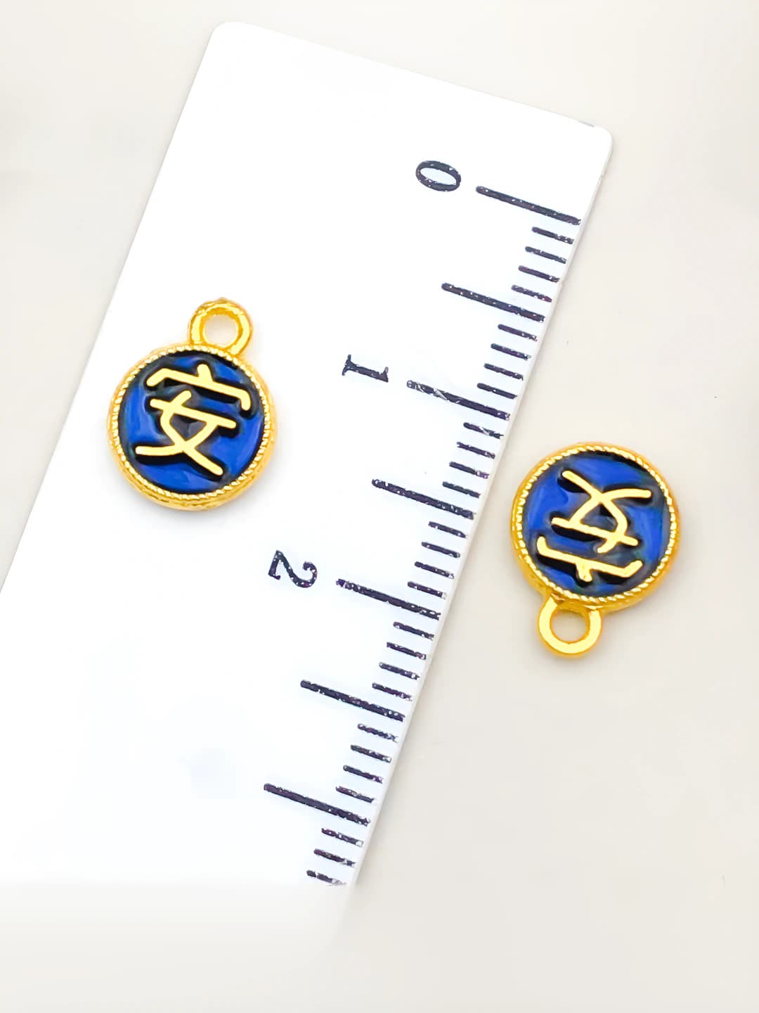 Blue 'An' character 10x8mm