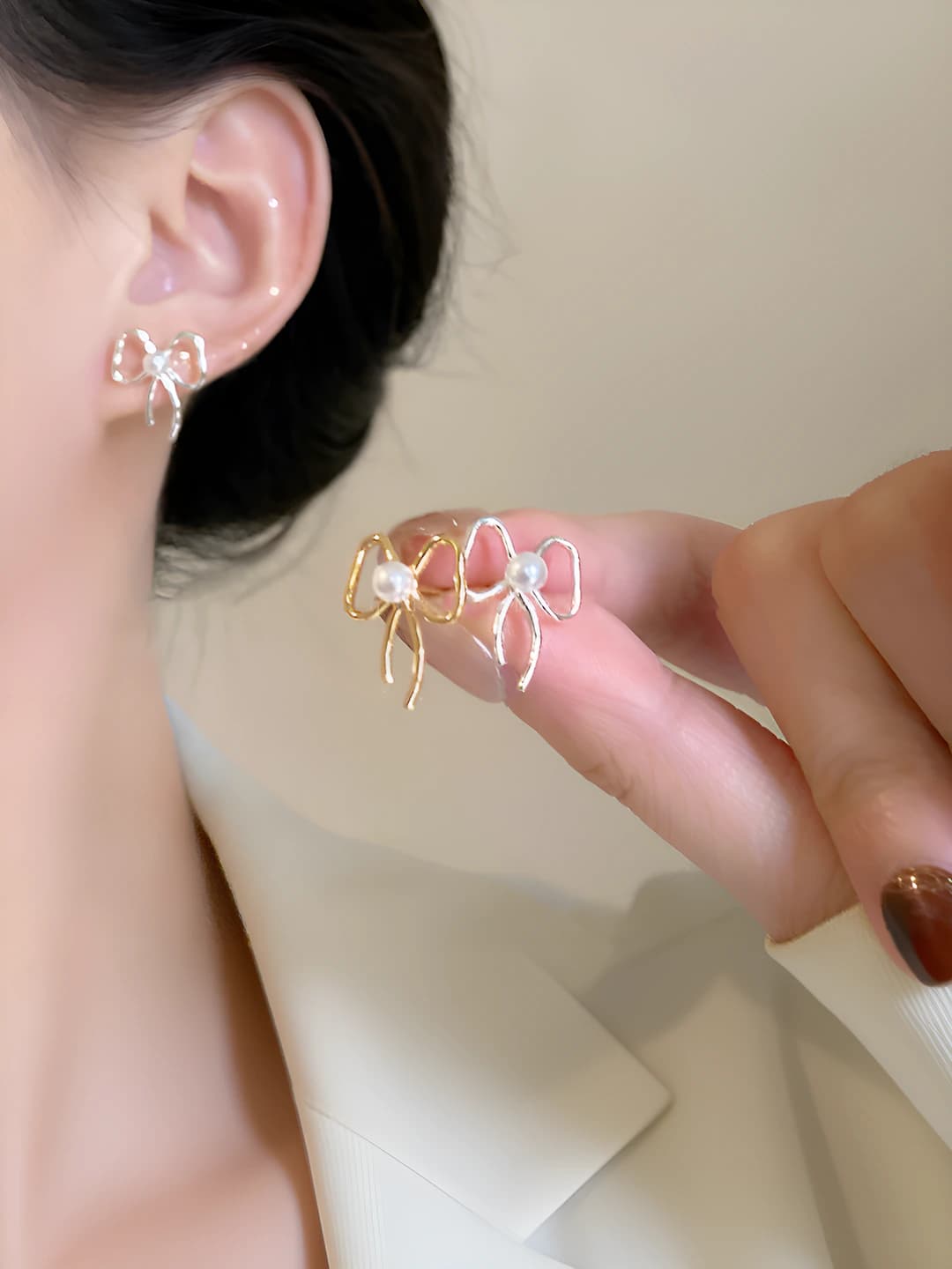 Women's bow pearl earrings: light luxury style, unique and delicate design element