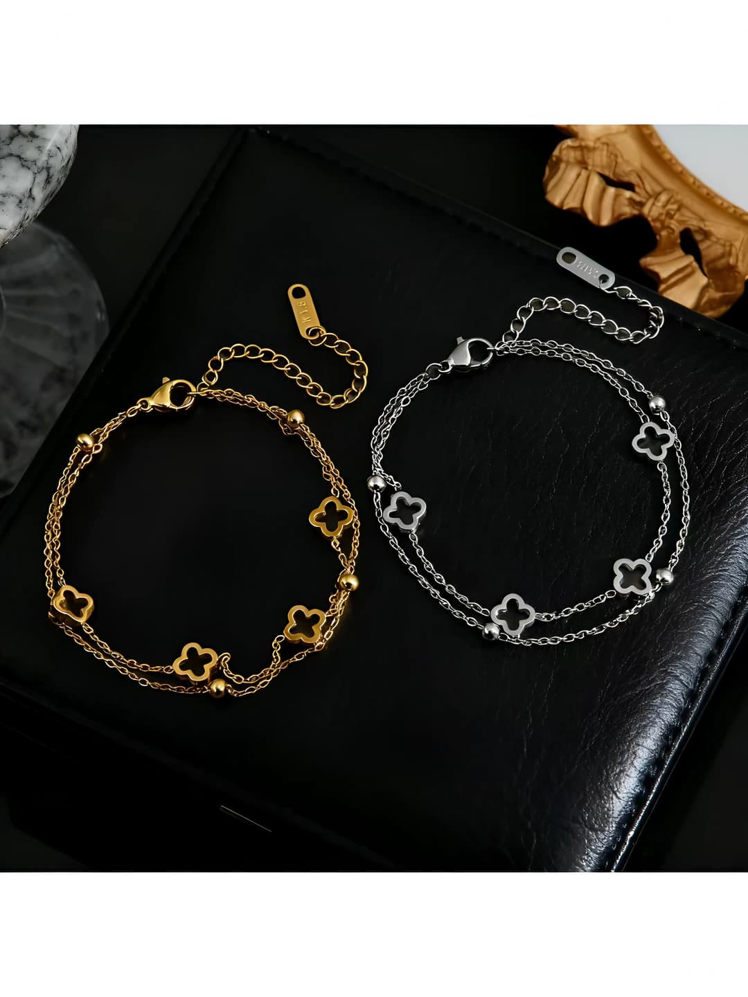 Ayollar uchun titan po'latdan ikki qatlamli to'rt bargli yonacha zanjirli bilaguzuk, rangi o'chmaydigan, hashamatli uslubdagi, gullar dizayn elementiga ega