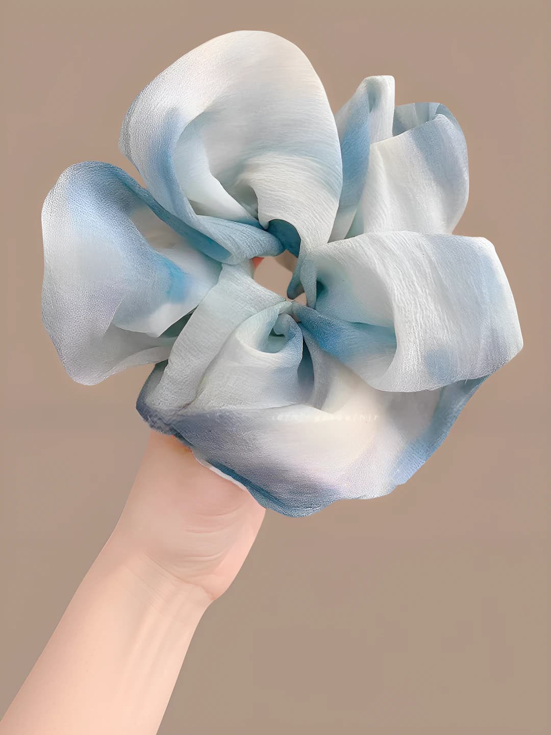 Blue ink hair tie, ~15 cm