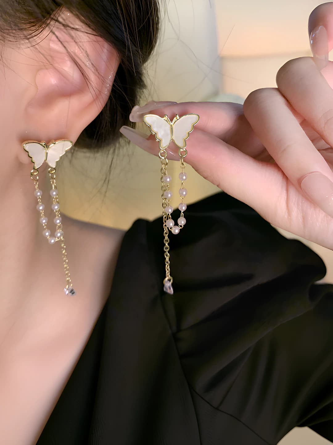 Women's long luxury style butterfly earrings with