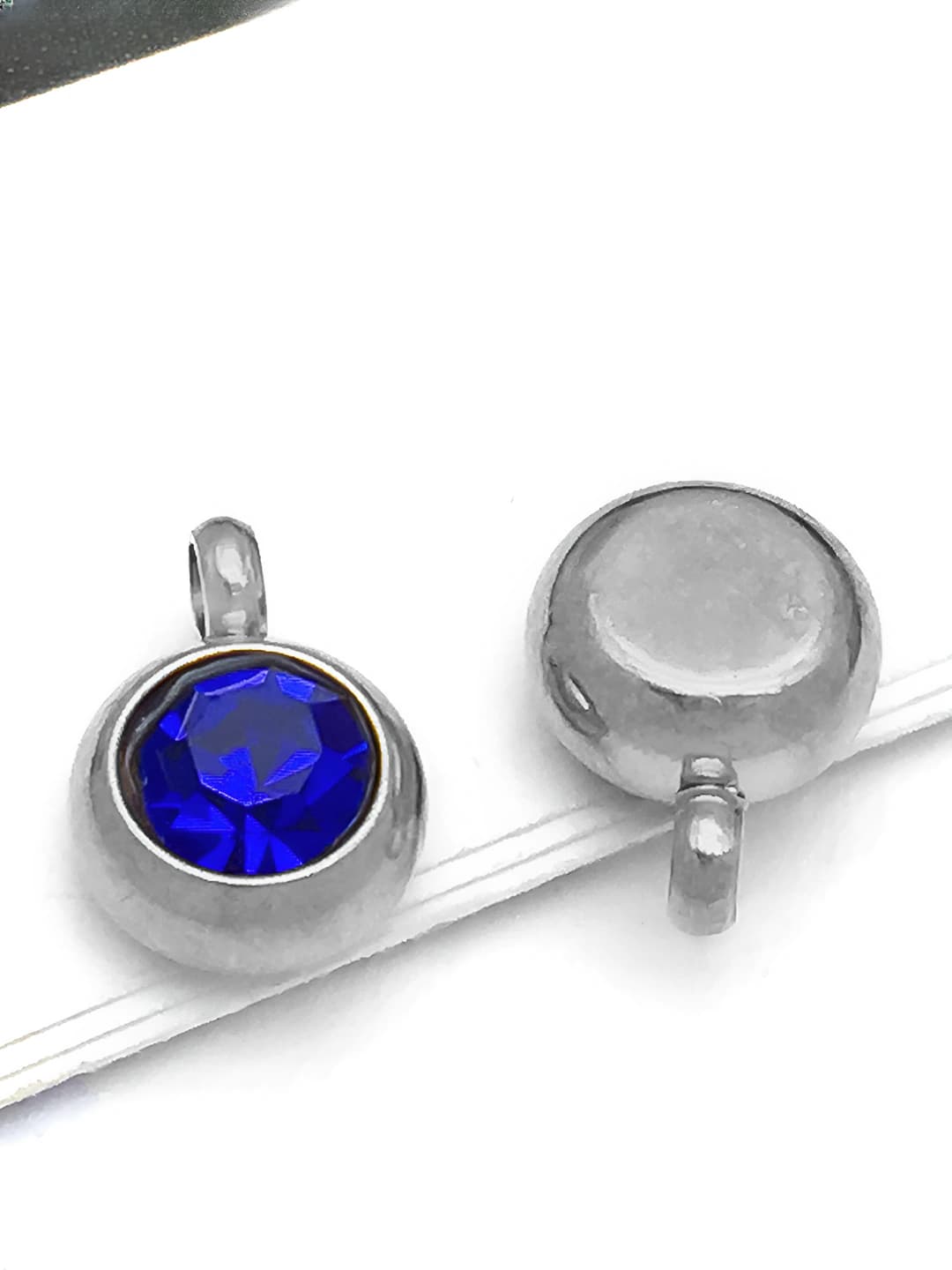 1 pc steel 6x8.5x4mm vertical 1.5mm September navy sapphire 0.5g