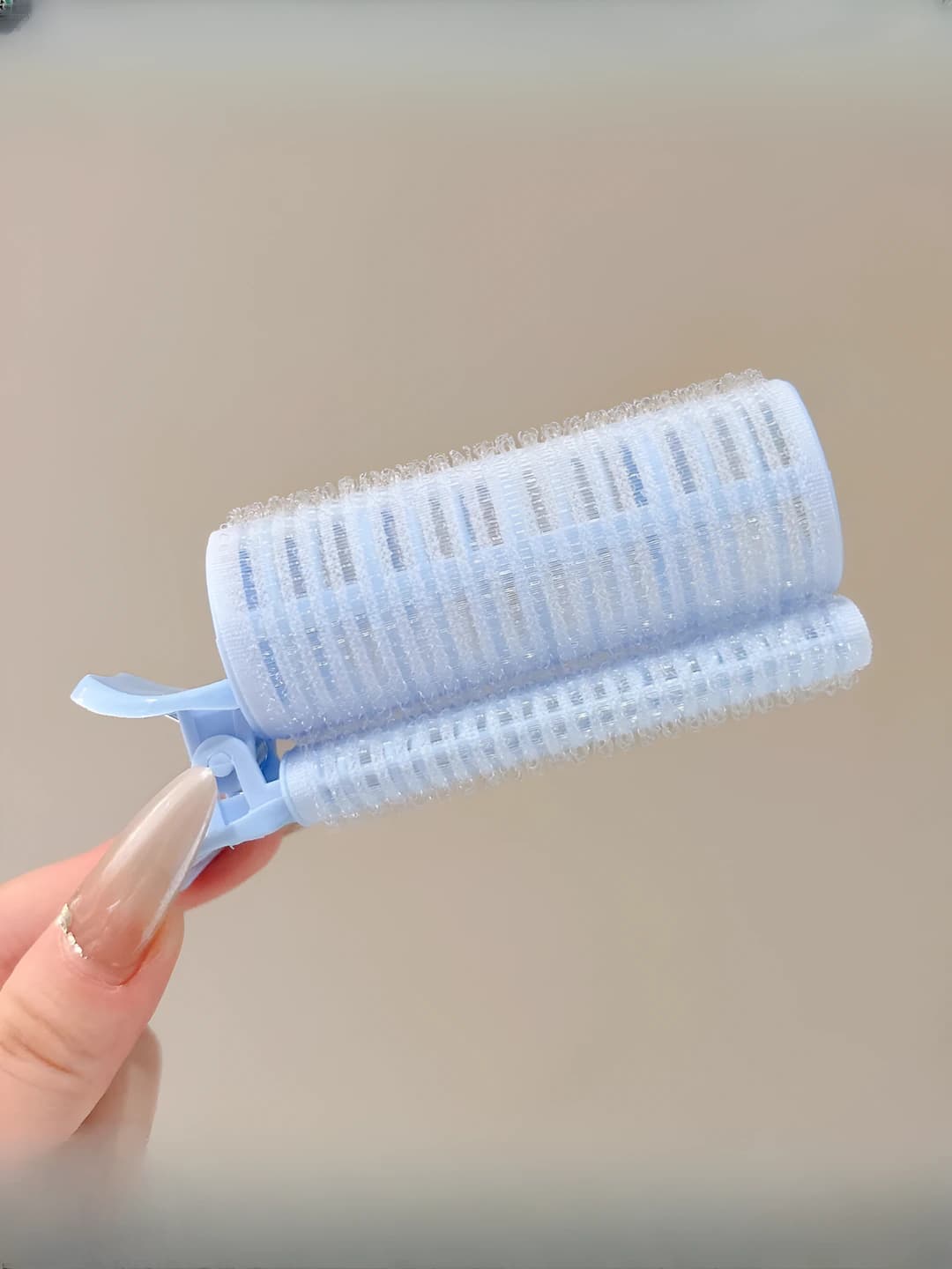 Blue curler ~10.5 cm