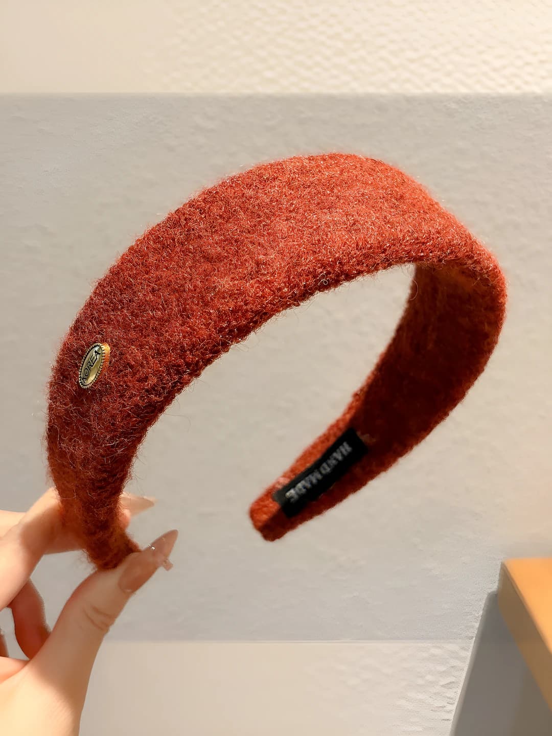 Red felt with gold logo