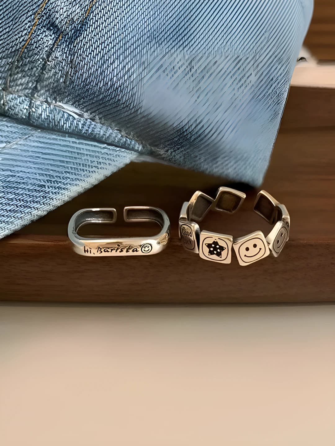 Women's retro style open ring with aged finish, smiley face and letter design element, made of copper