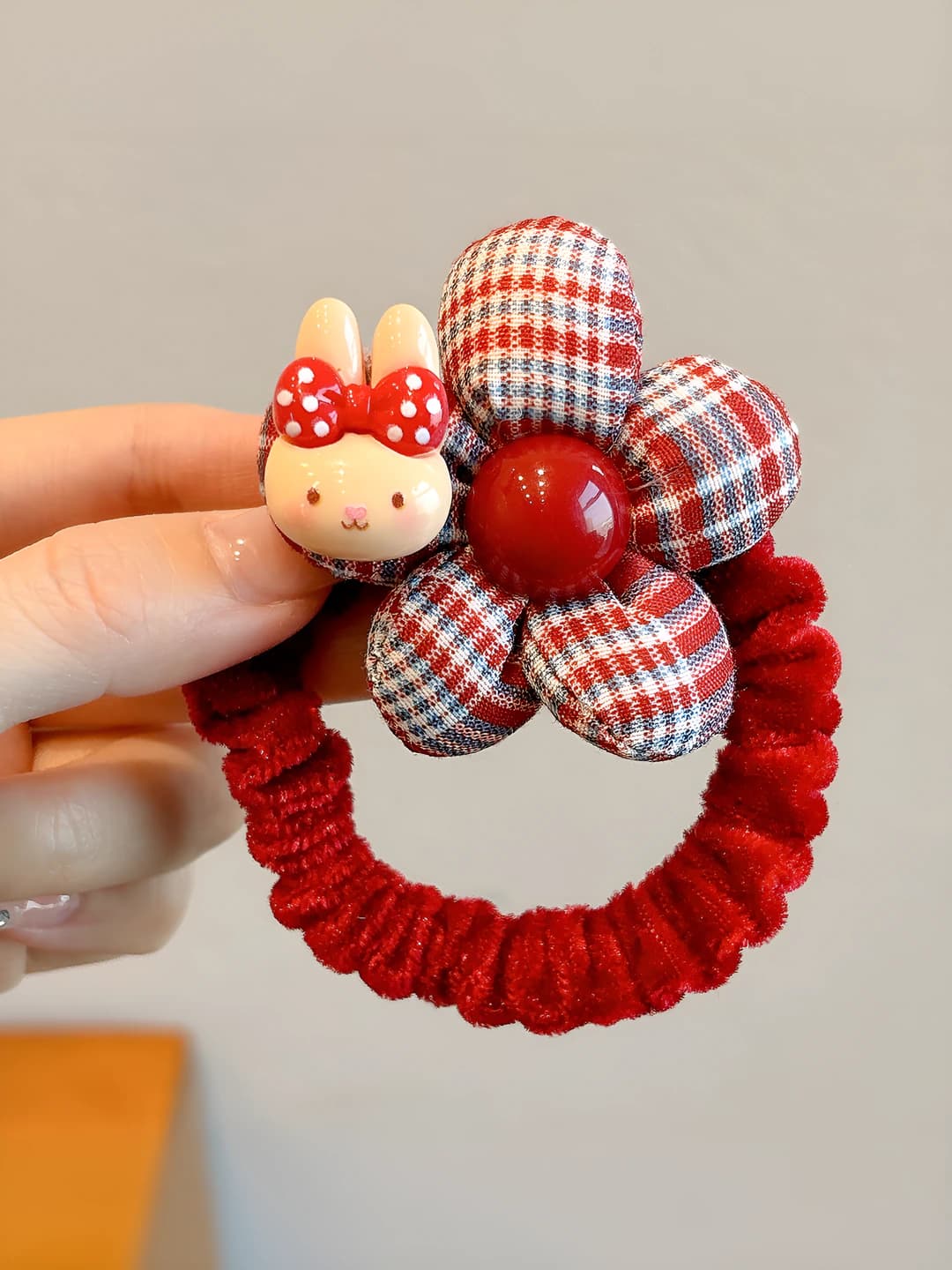 1# Rabbit red-white striped hair tie, ~6.5 cm