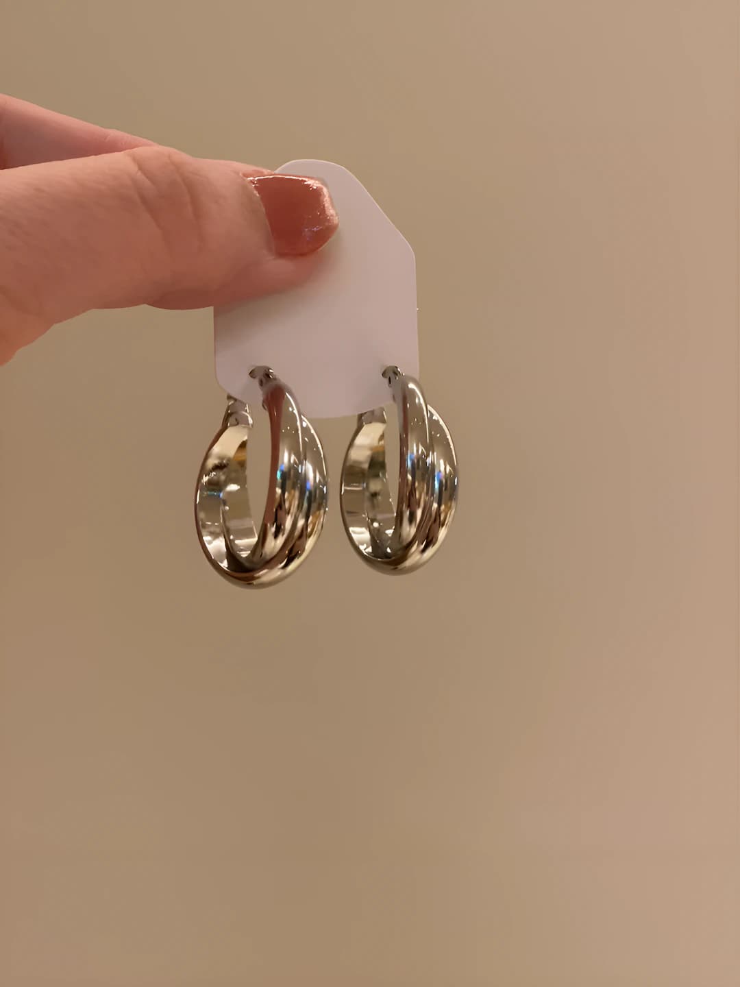 Glossy silver twisted hoop earrings ~2.1 cm