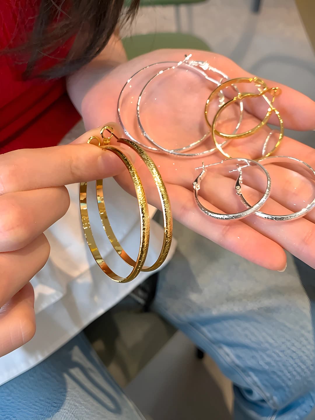 Women's large geometric hoop earrings with minimalist design element
