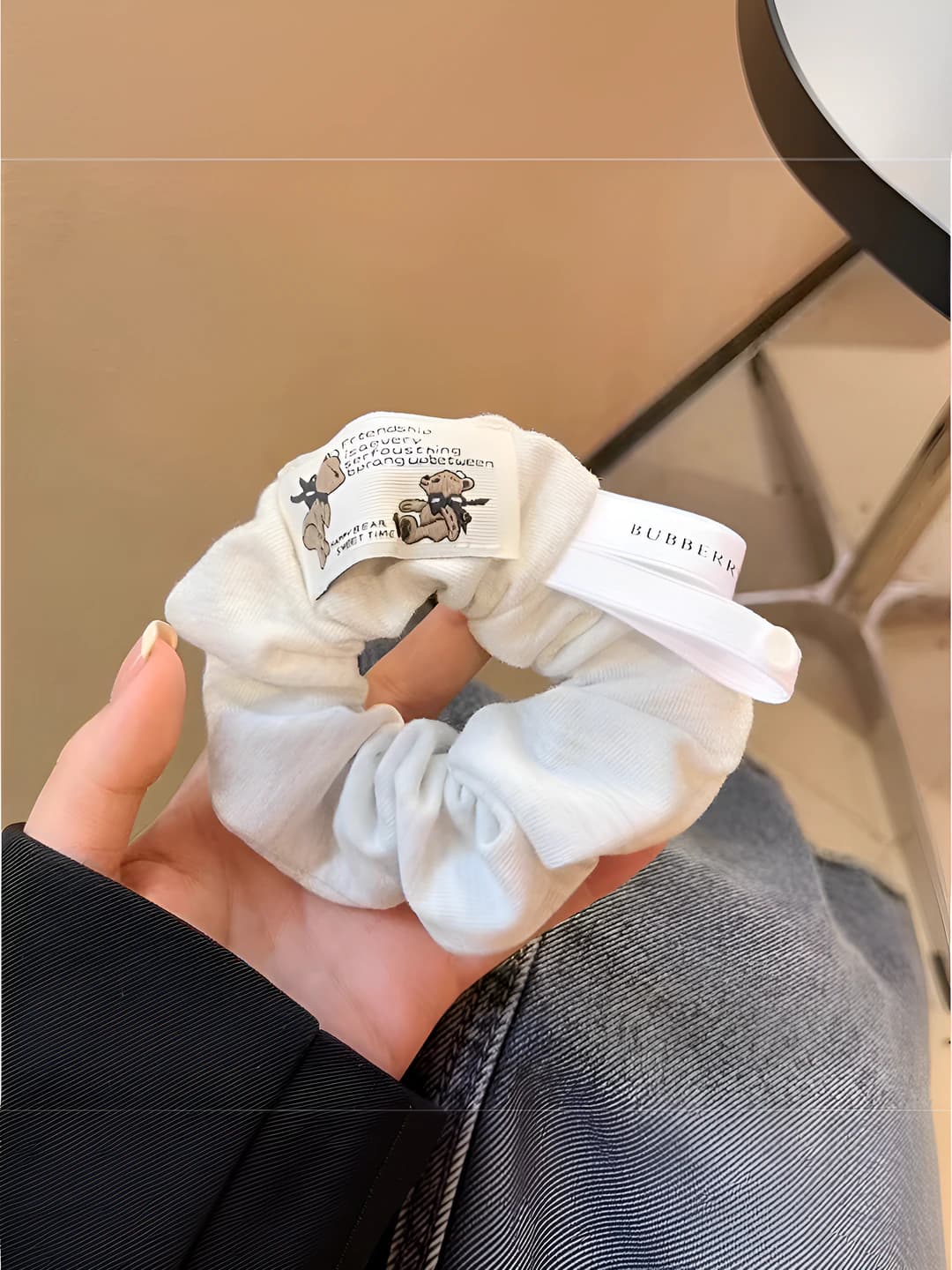 White tag bear hair tie