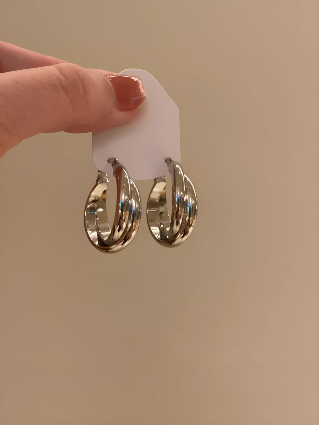 Glossy silver twisted hoop earrings ~2.1 cm