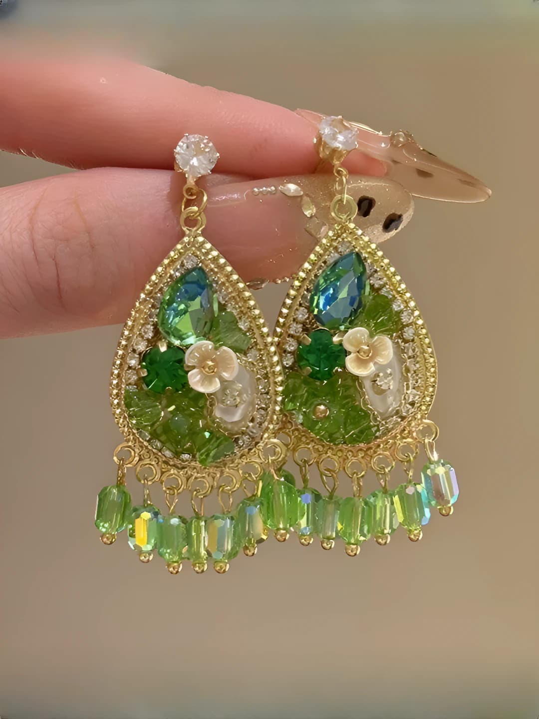 Women's earrings: silver post, crystal inlay, teardrop shape with tassels, handmade, green color, versatile style