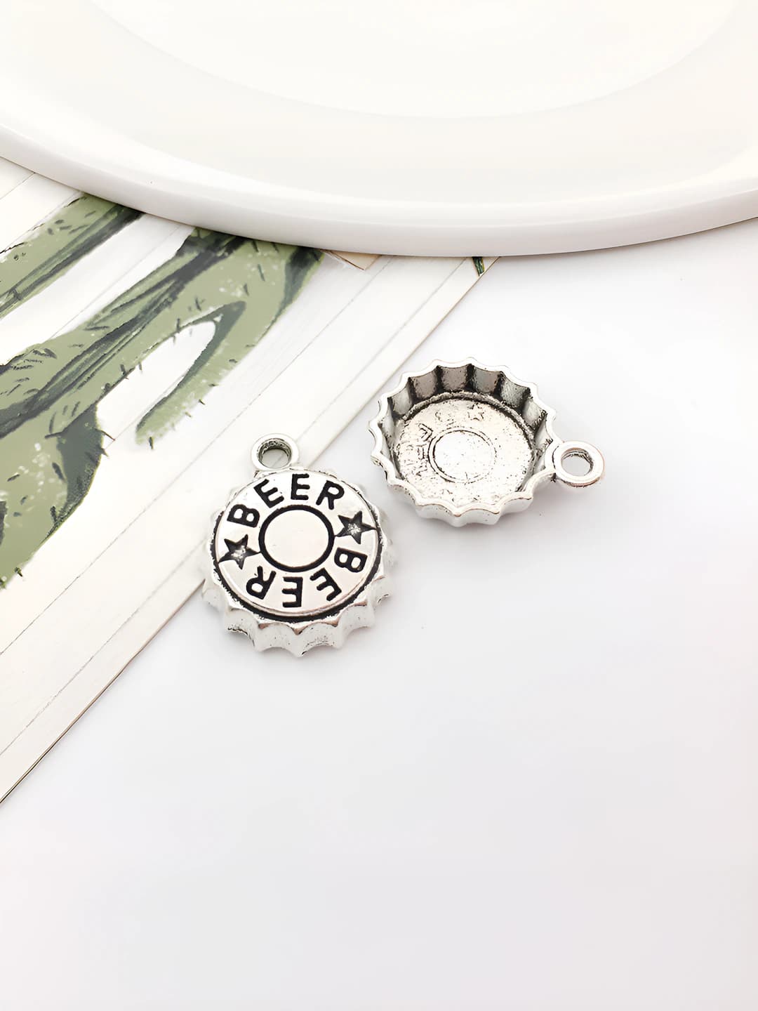 Antique silver bottle cap