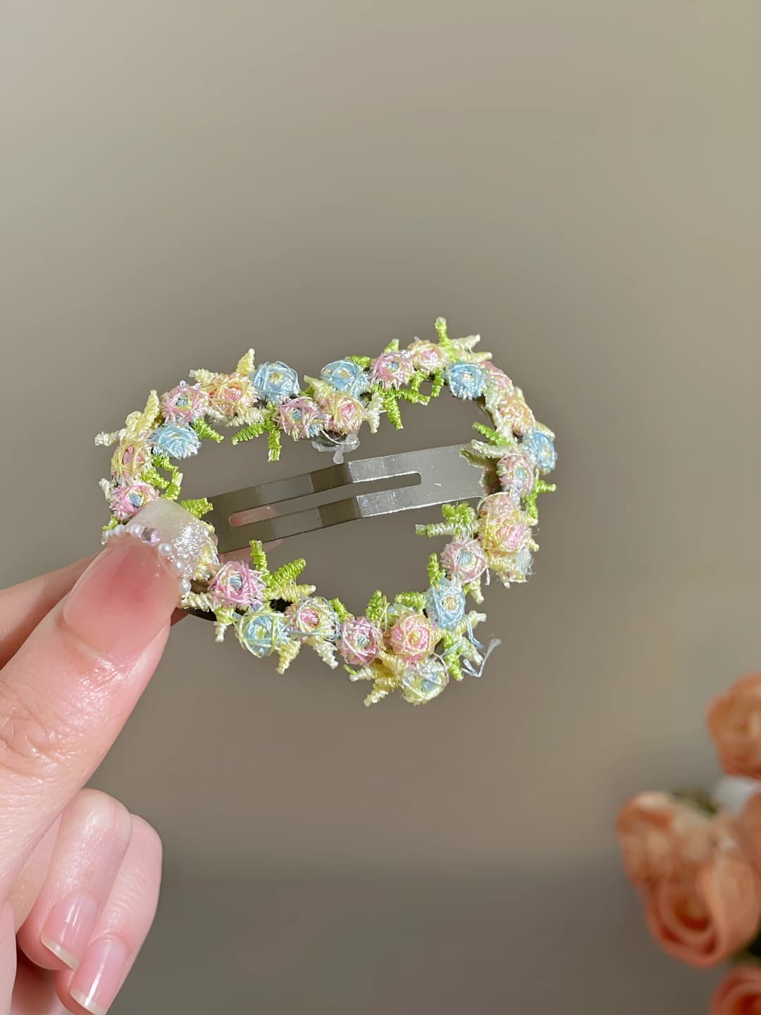 Green embroidered heart clip