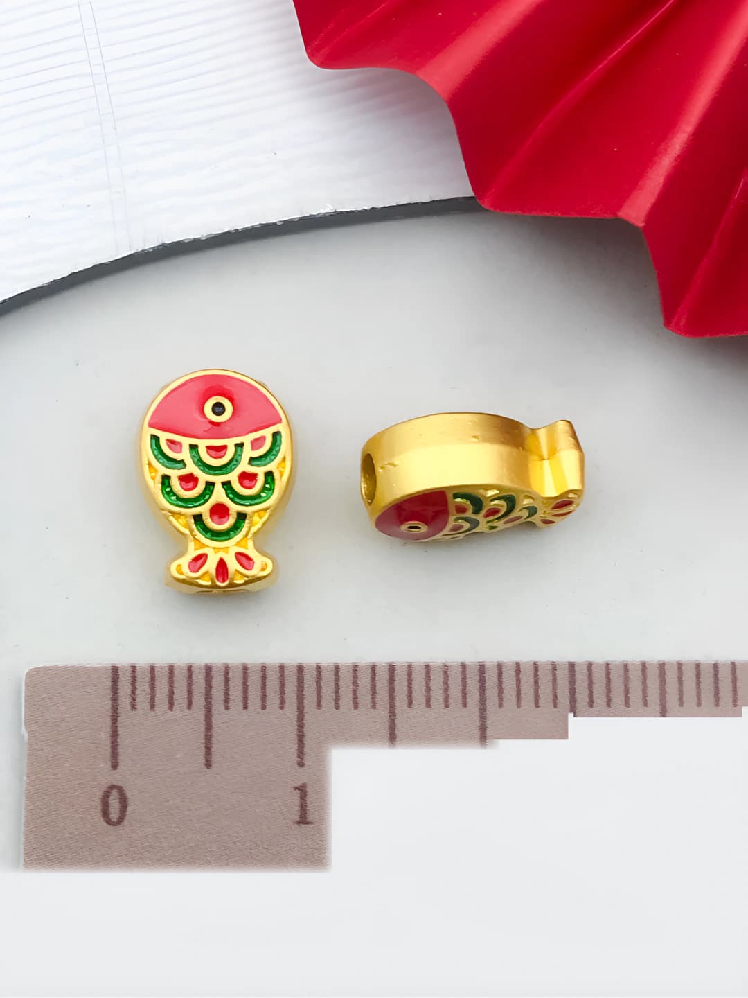 Red-green double-sided bead 12x9mm