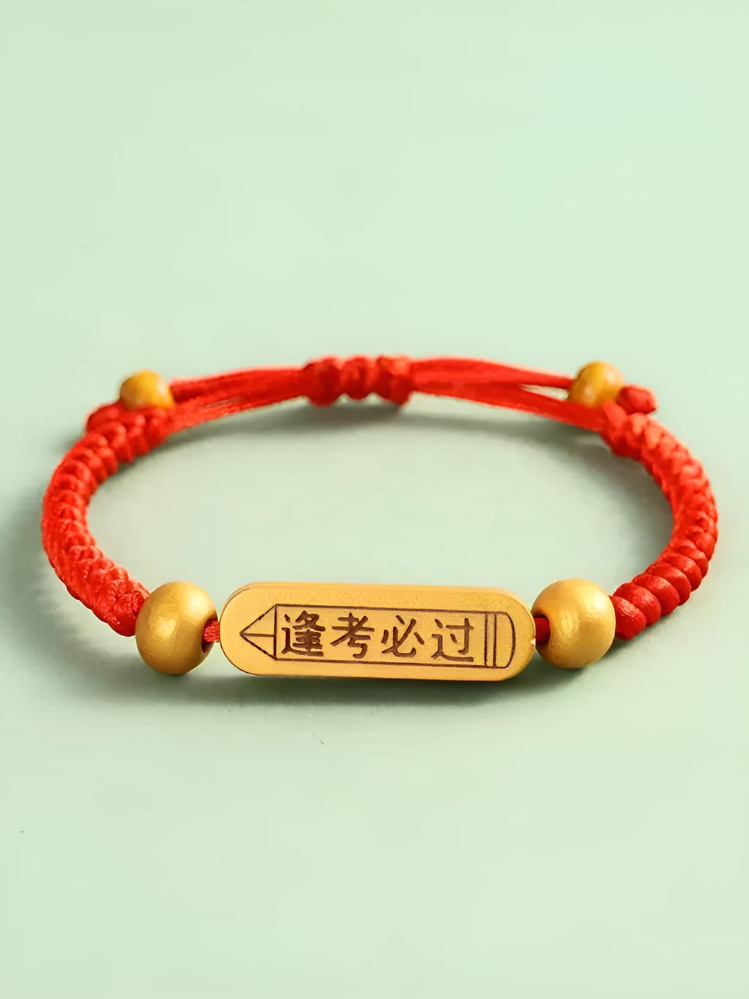 Gold 'Exam Success' bracelet