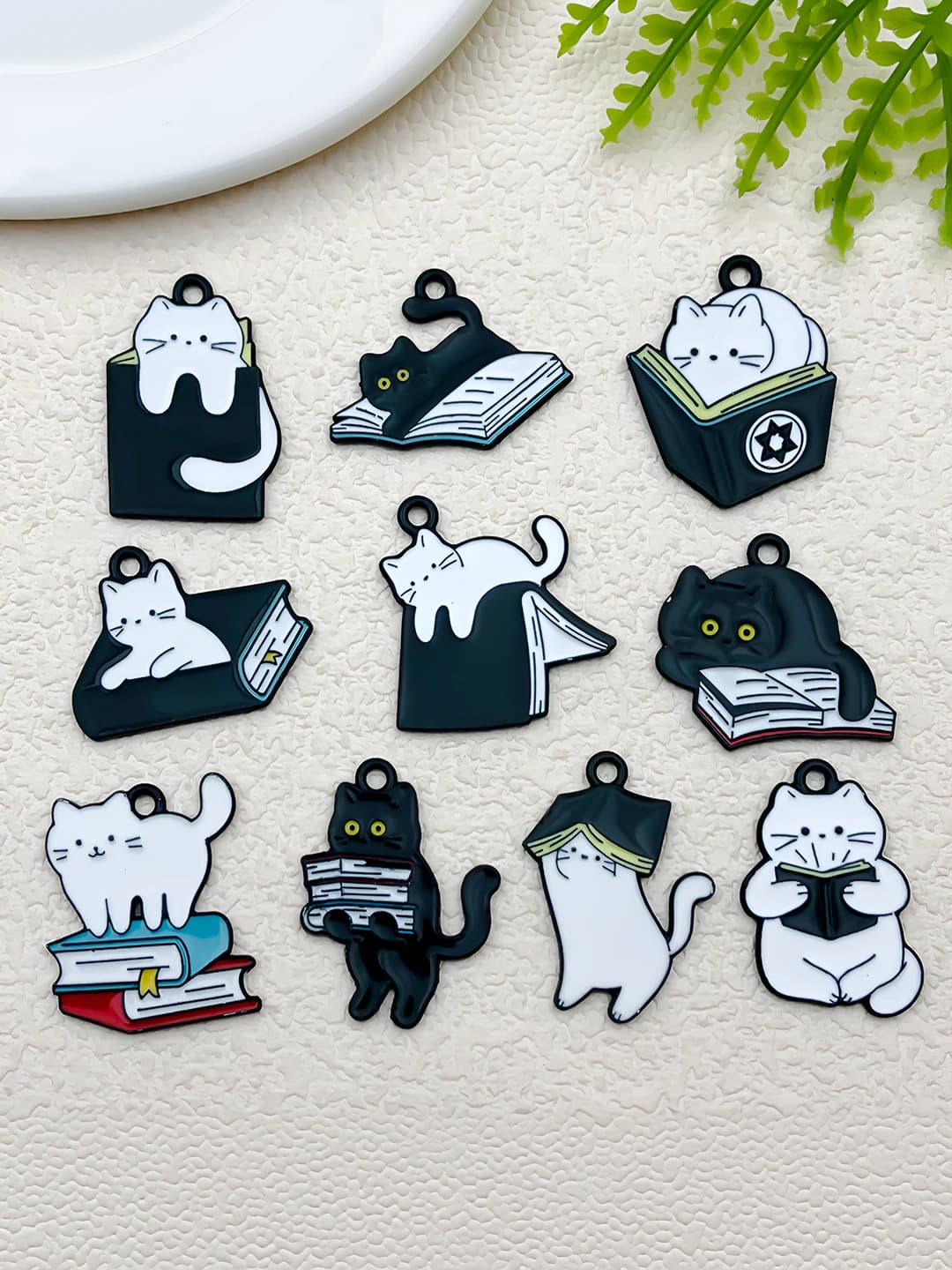 Cute black and white book-reading cat charms, zinc alloy with enamel, for bracelets, necklaces, keychains and other accessories