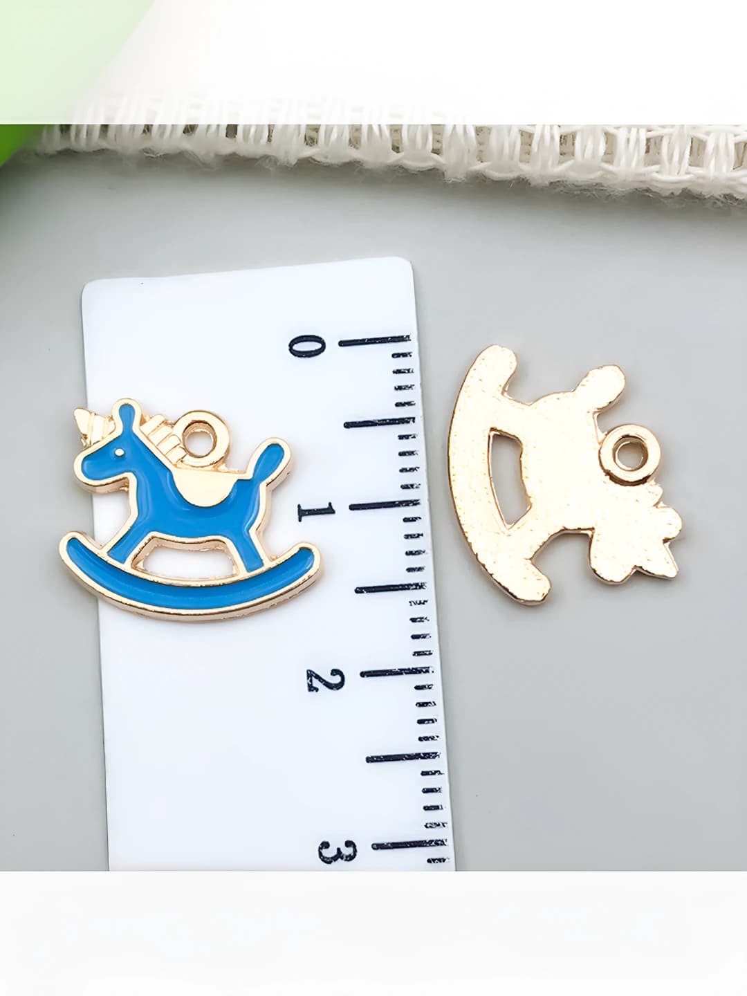 1 teal unicorn rocking horse 15.7x12.7mm-0.8g