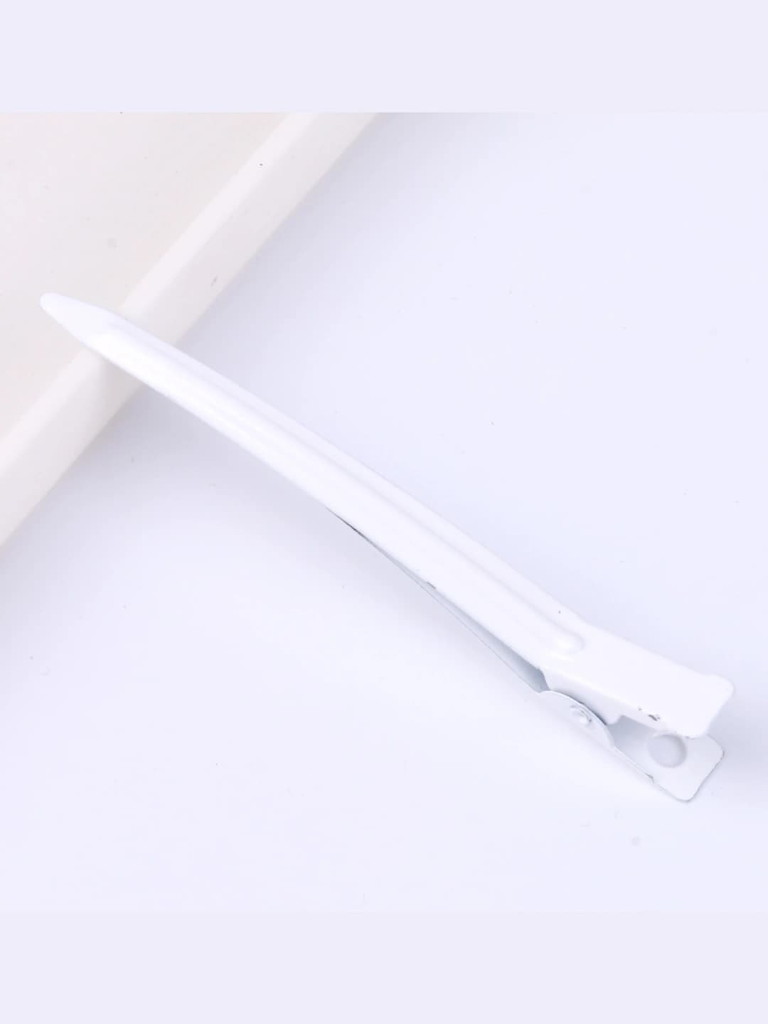 White pointed clip