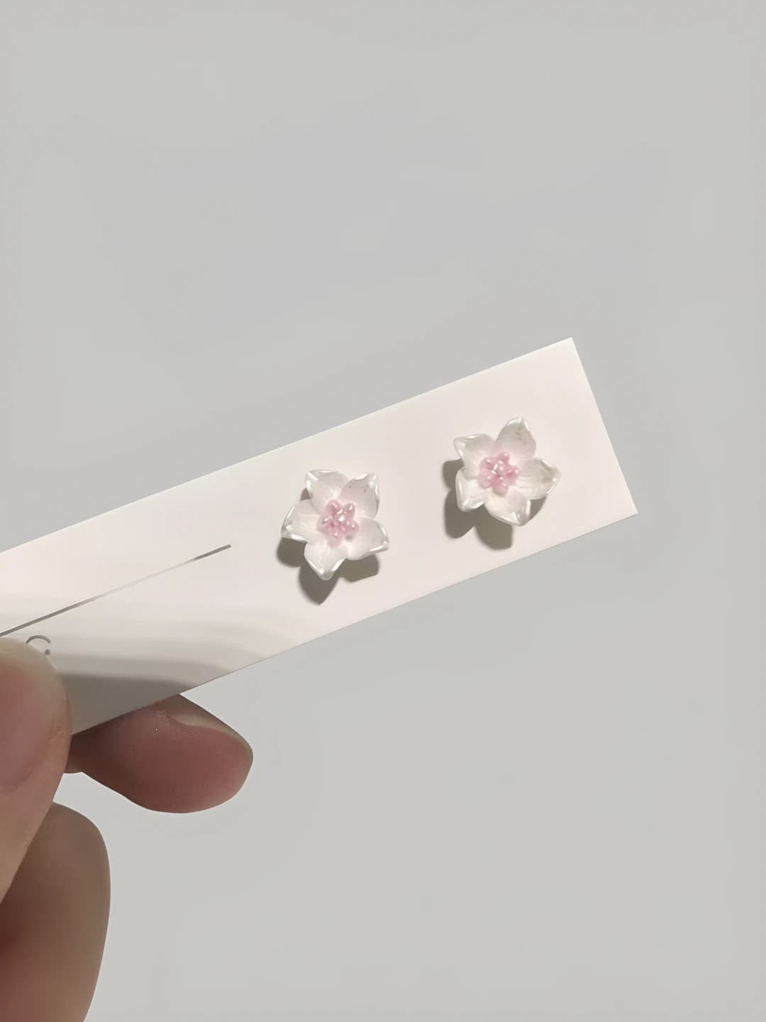 White camellia magnetic ear clips pair