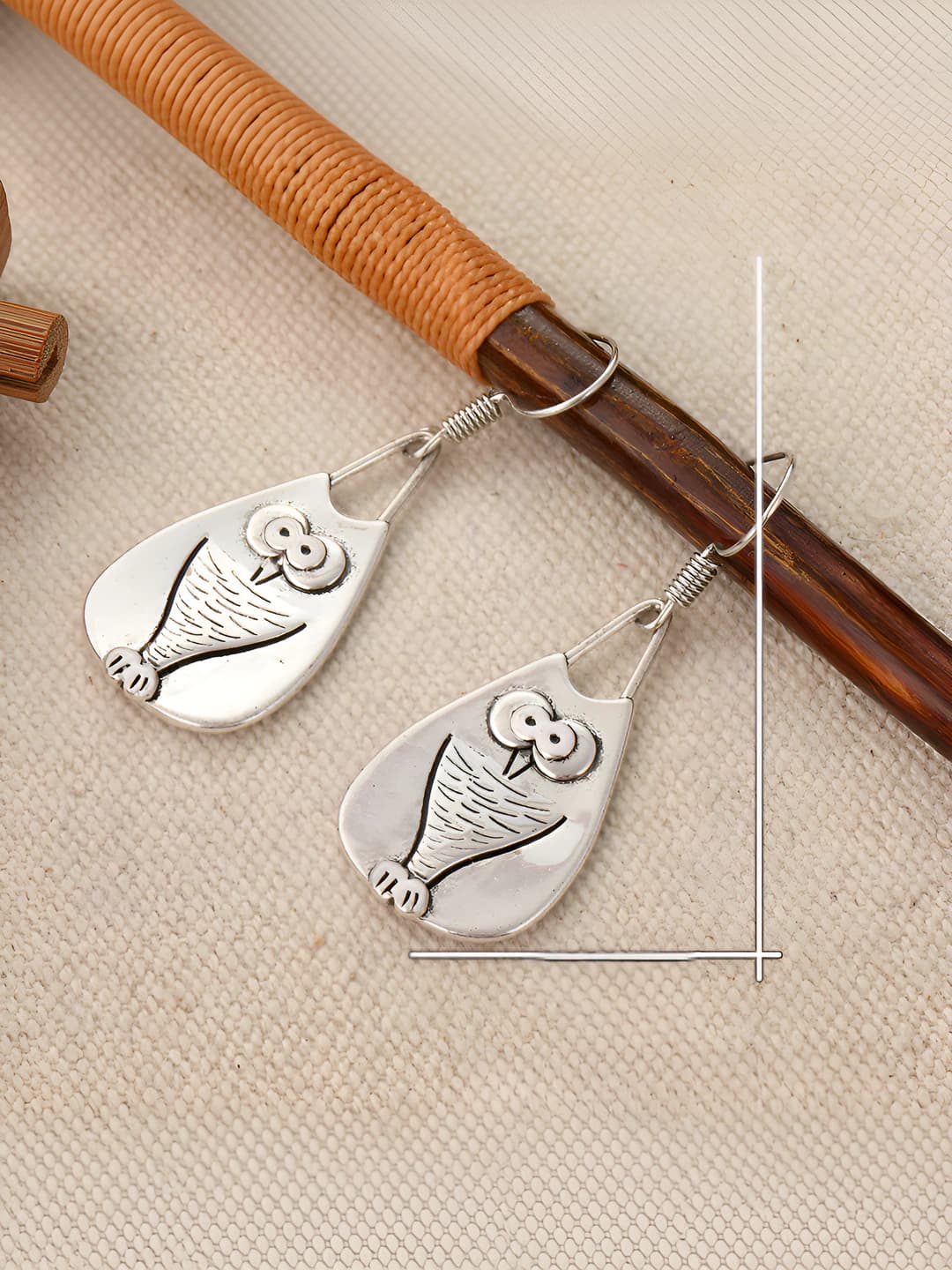 Women's retro earrings with blue sapphire and eight-pointed star in copper