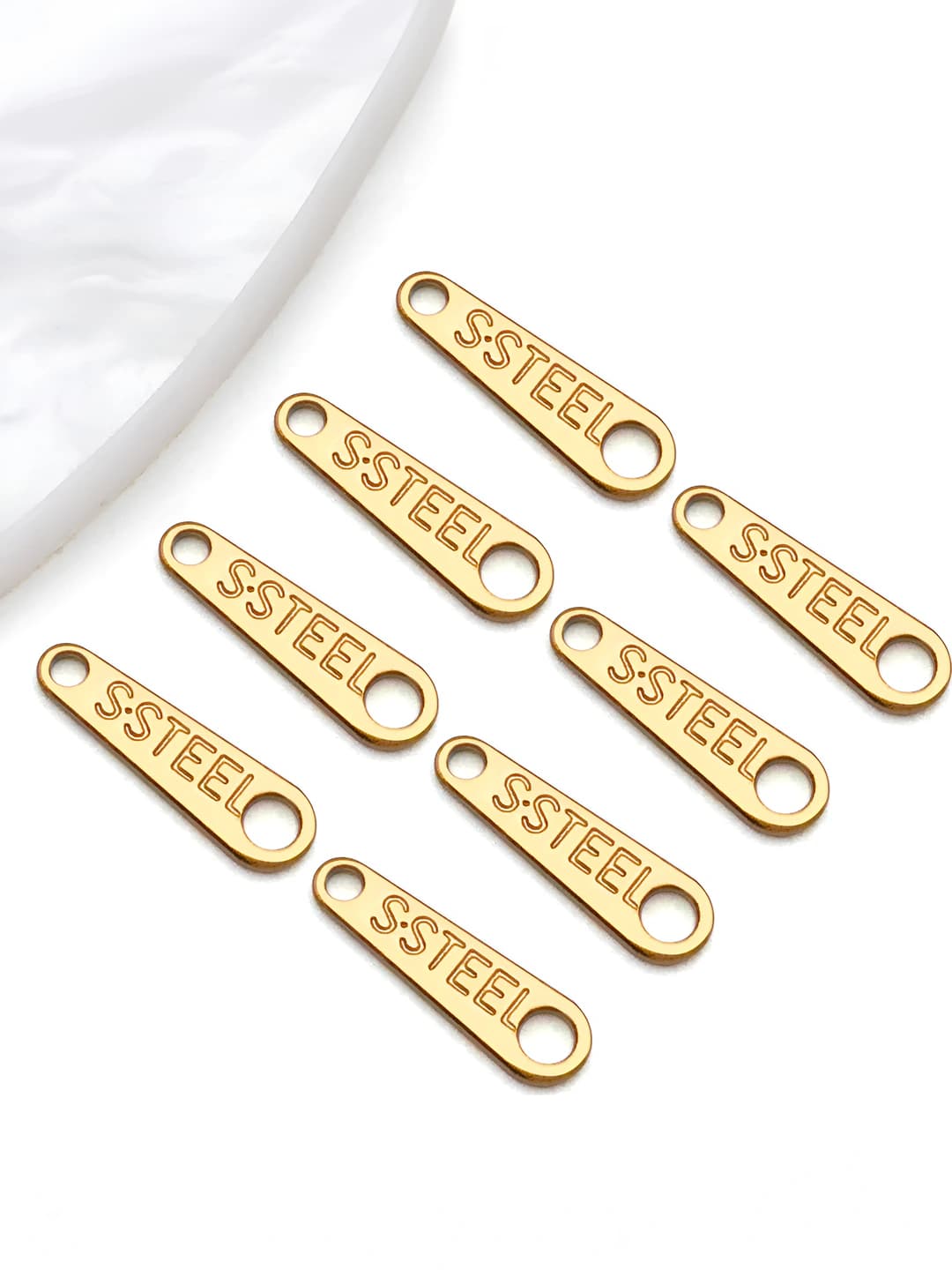 Gold steel teardrop charm 3x10x1mm