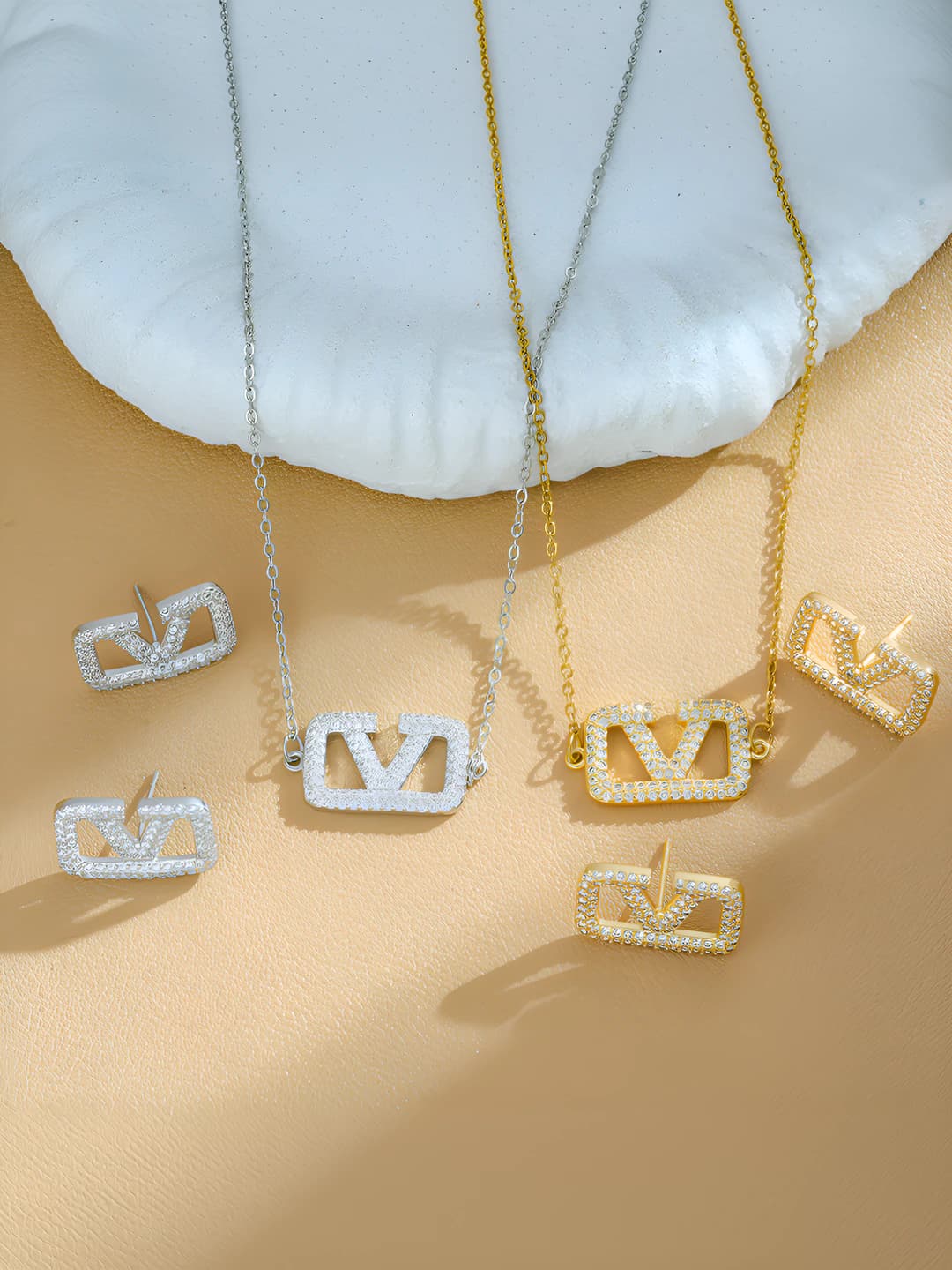 Women's titanium steel jewelry set with letter V: stylish necklace and earrings