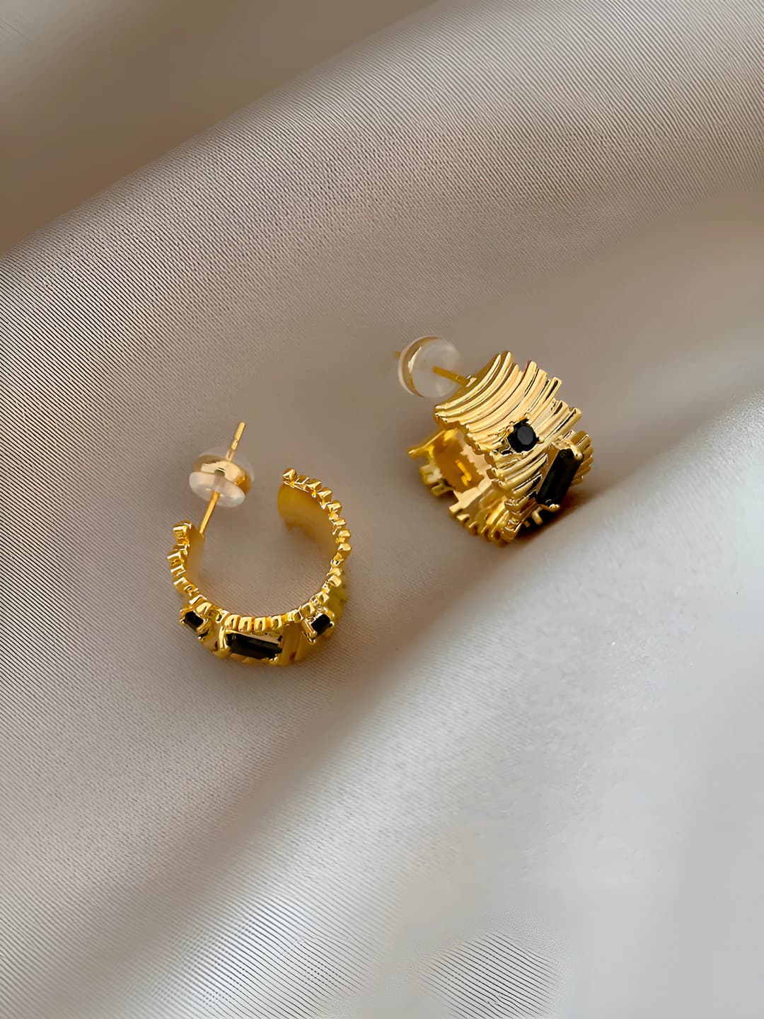 Black & gold studs