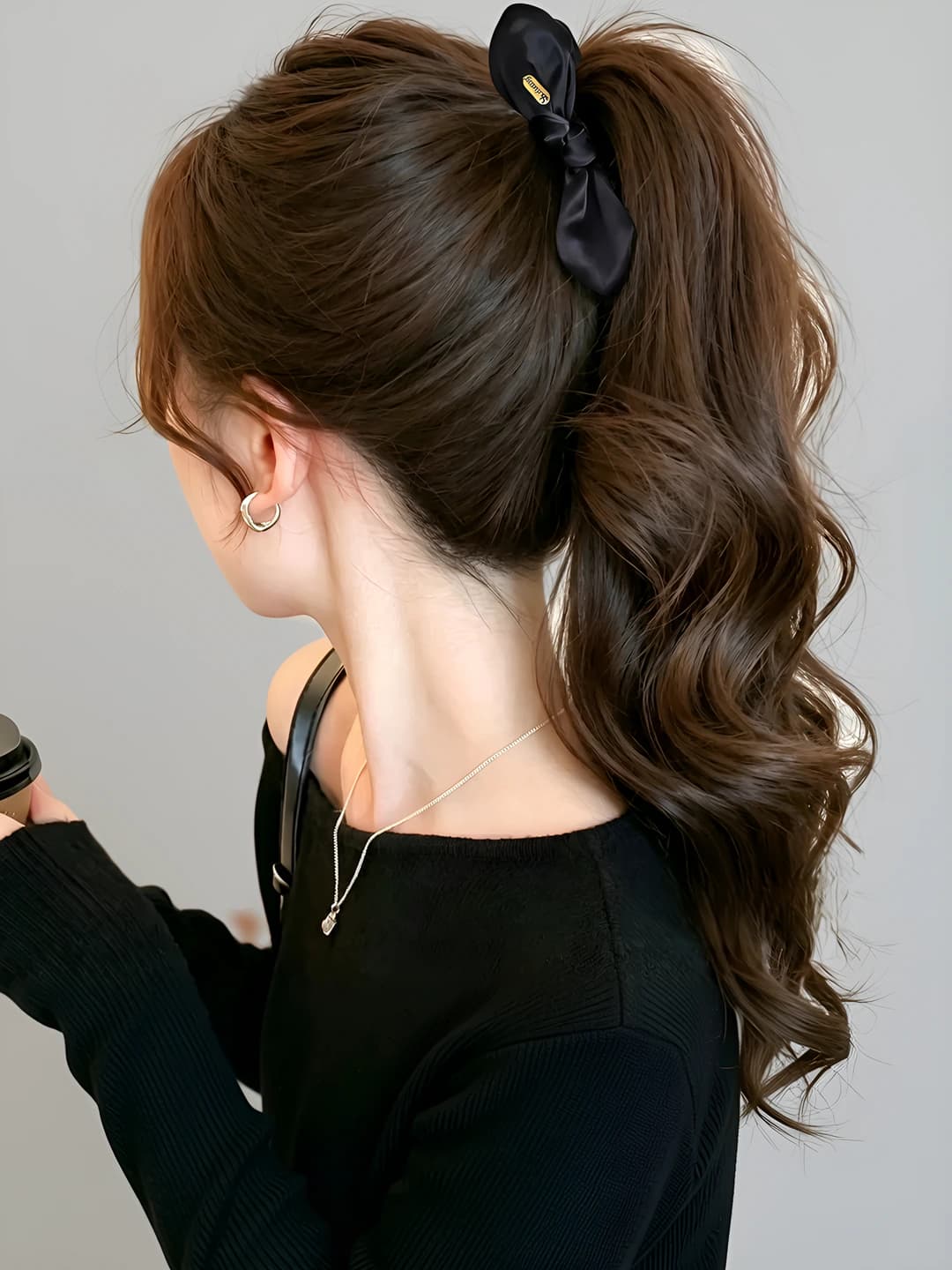 Black, gold logo, banana clip