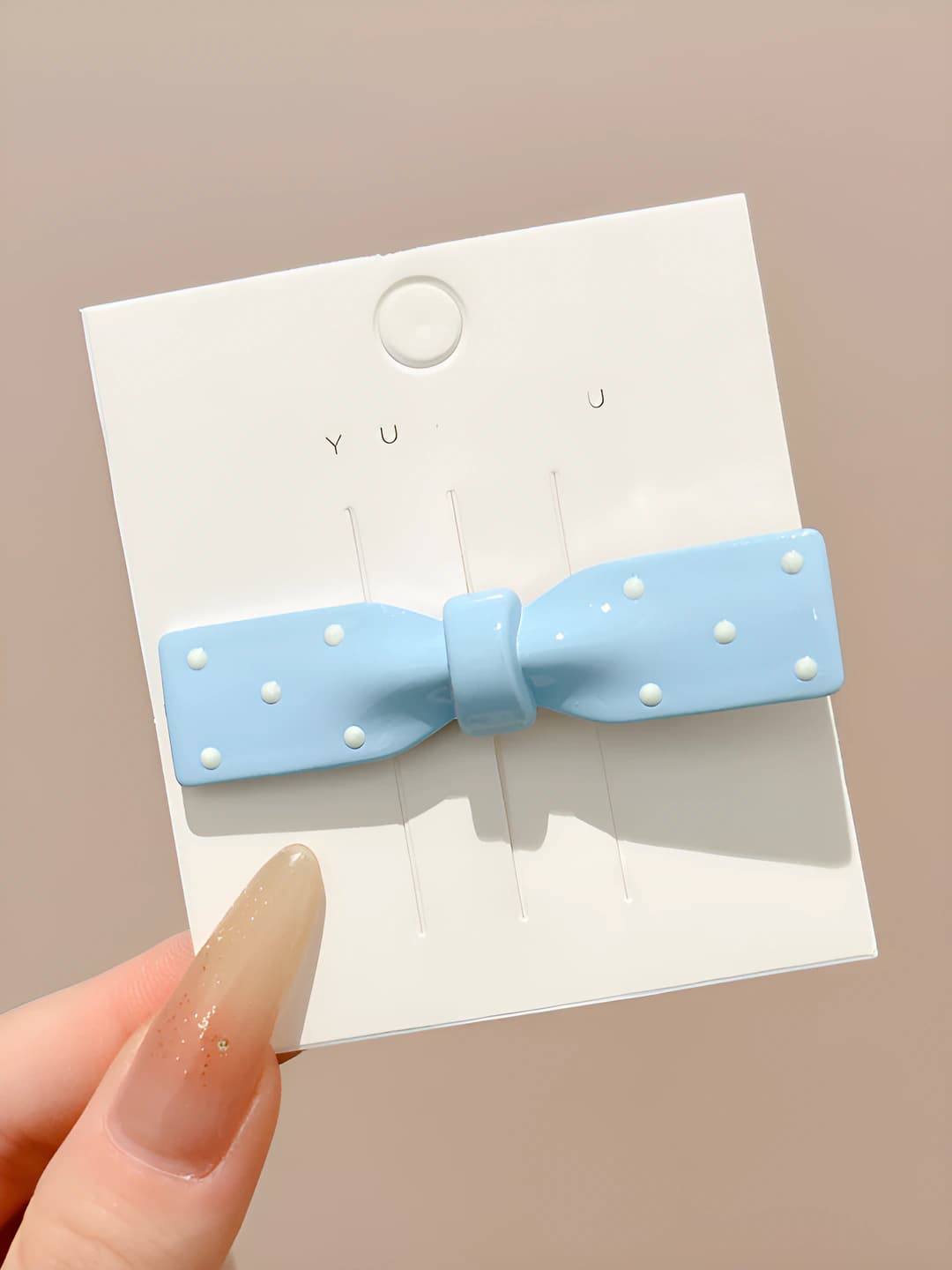 3# Blue bow, oval, ~6.5 cm