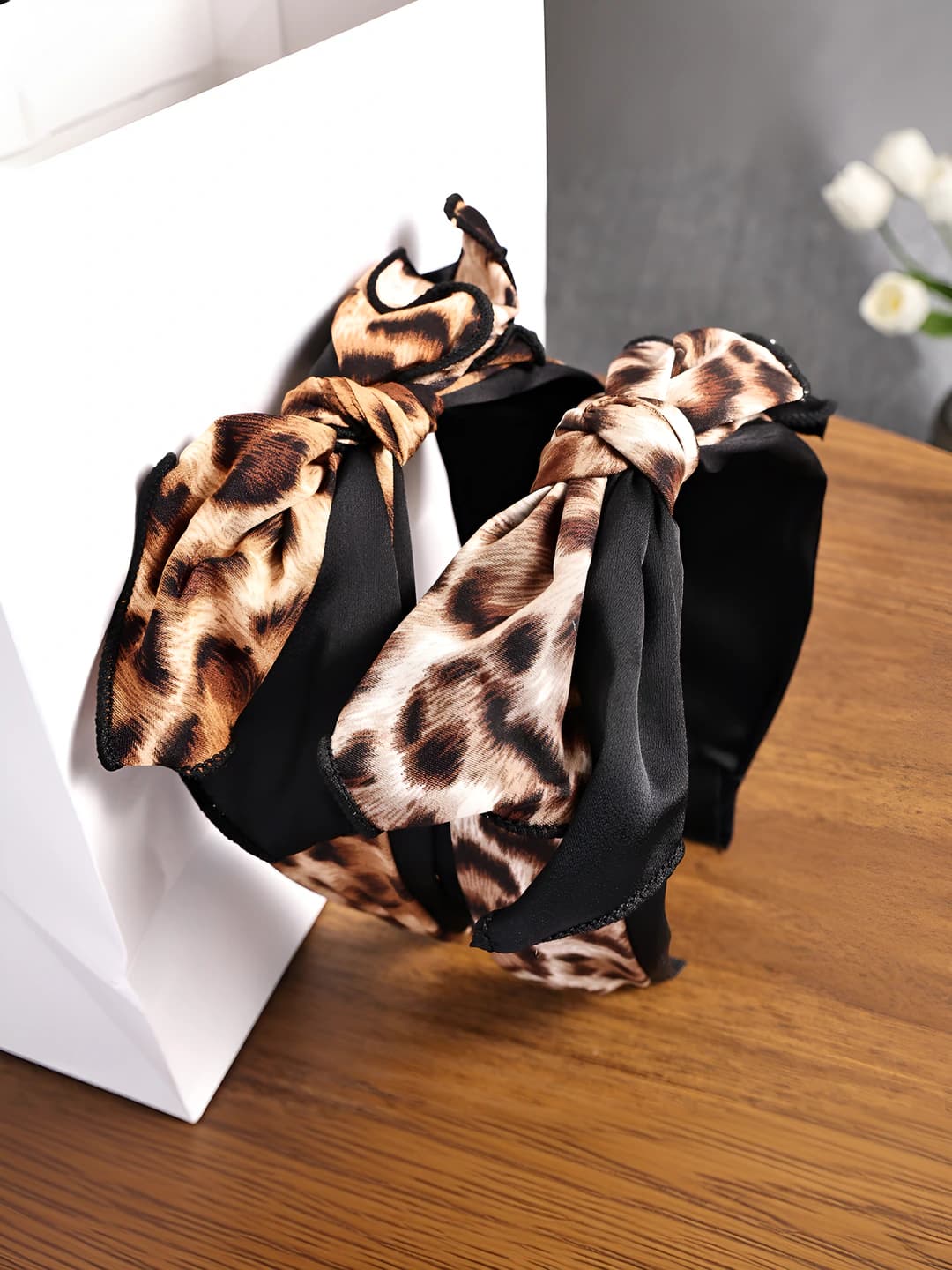 Women's retro style headband with leopard print and bow