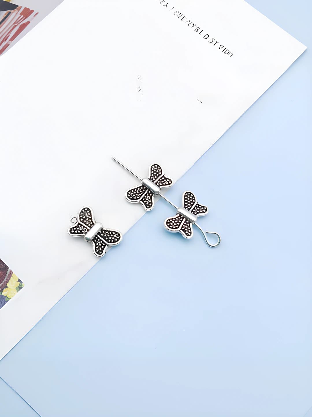 1 шт бабочка, 10x6mm, 0.4g, 1 отвор