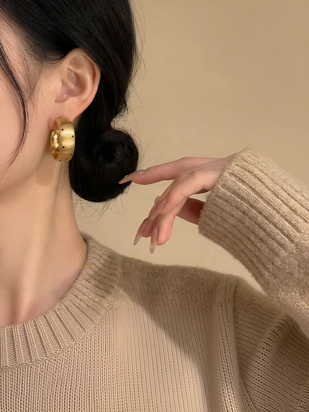 Gold brushed with black dots earrings