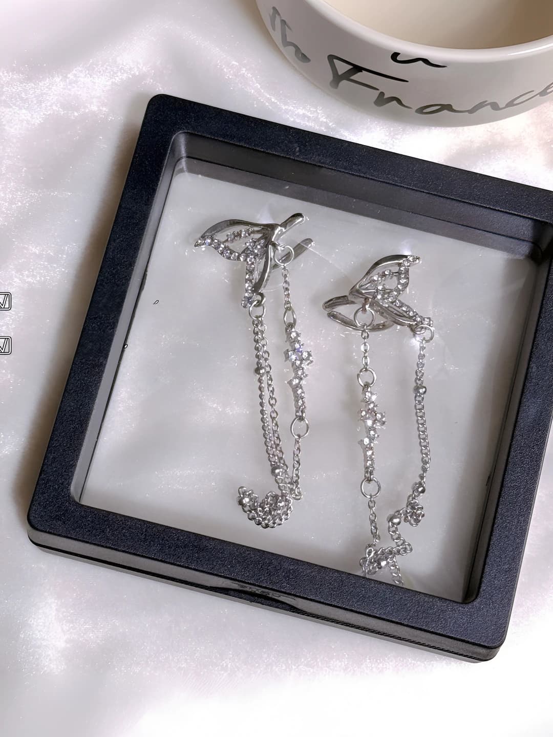Fish tail tassel ear cuff left