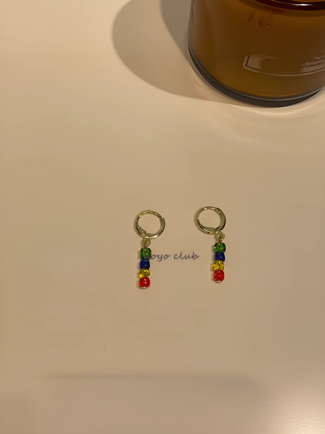 Red-yellow-blue hoop earrings pair