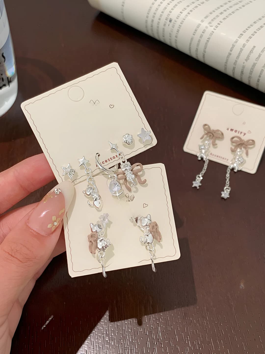 Women's earrings: set with zircon, silver 925, bow, star and cat design