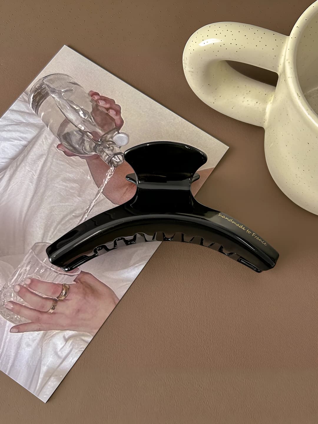 Gold logo arc hanger