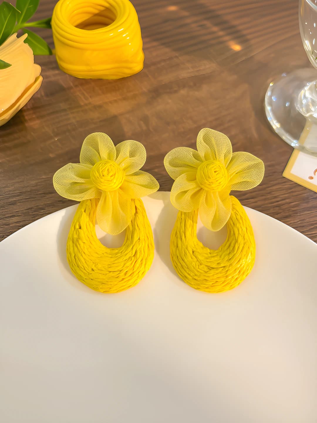 Yellow woven flower hoop earrings
