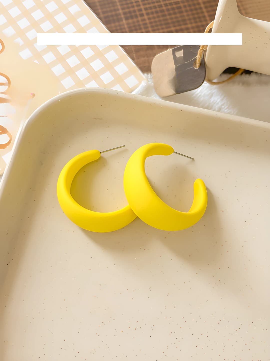 Yellow C-shape earrings