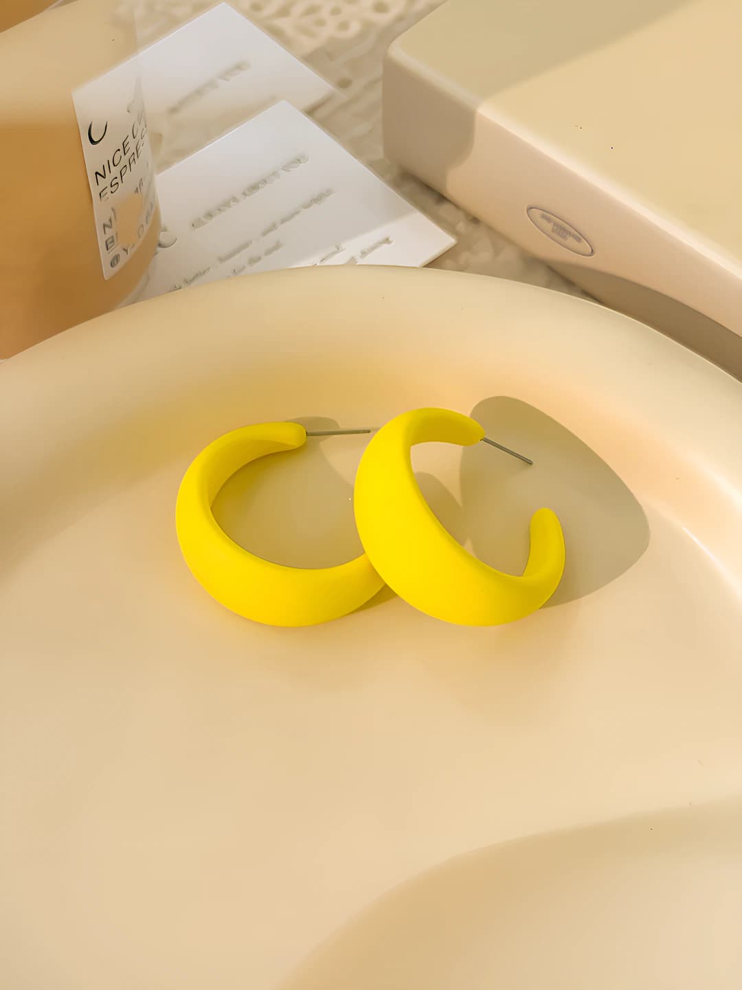 Yellow C-shape earrings