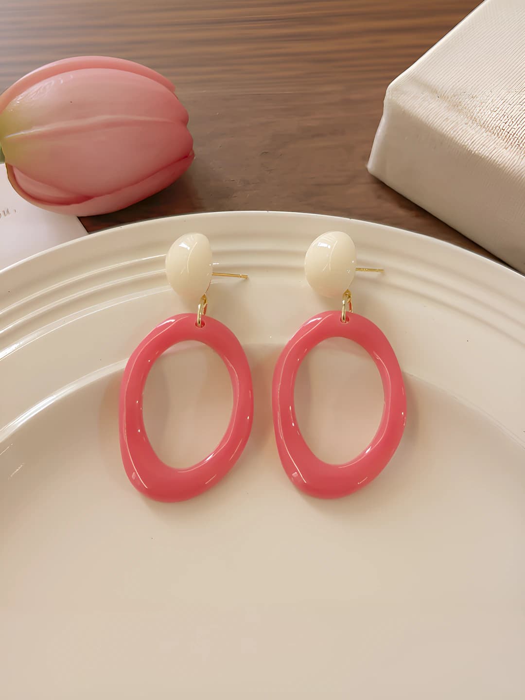 Rose red irregular cone stud earrings