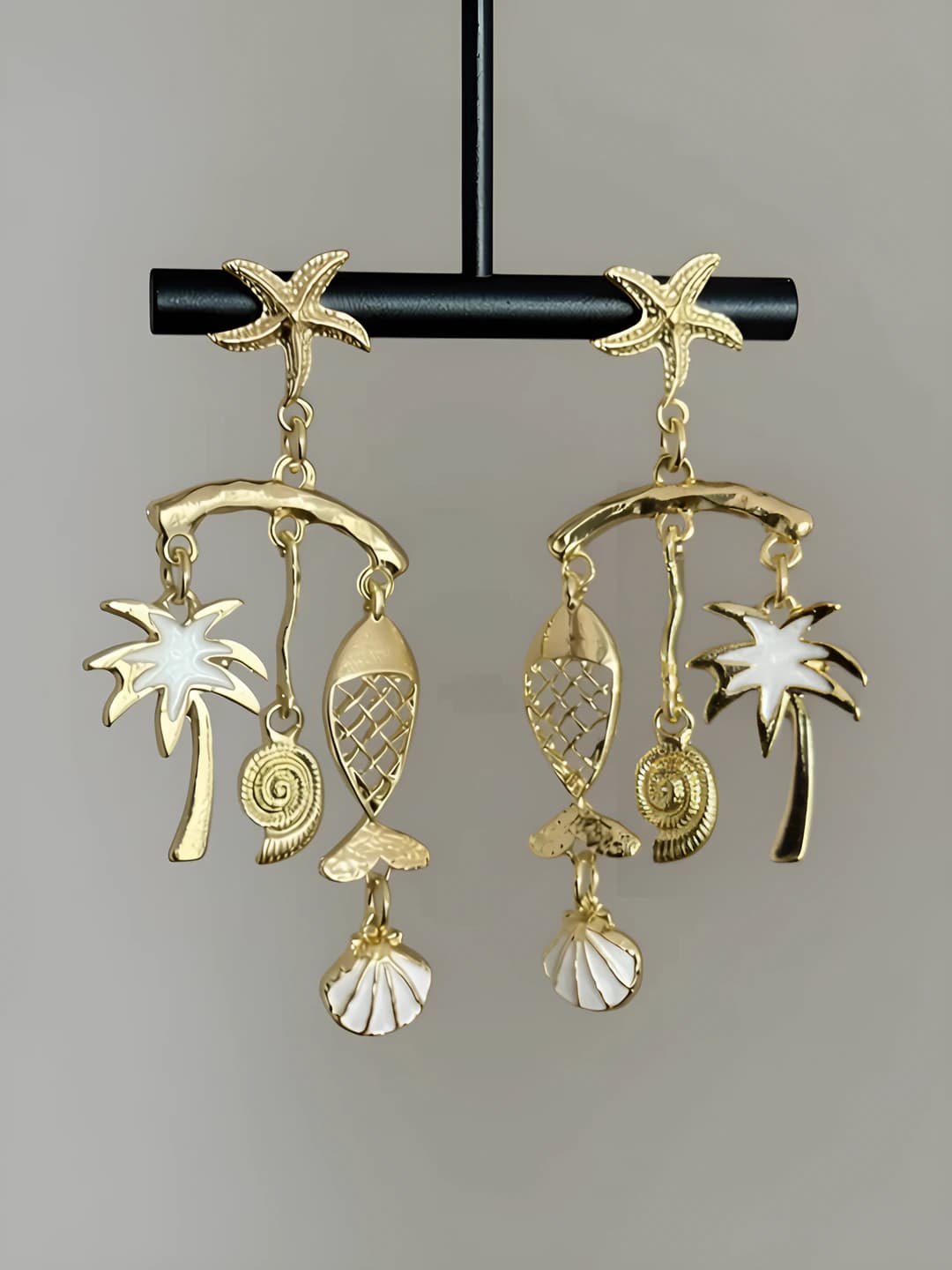 Women's retro style summer earrings with seashell, starfish and tassel details