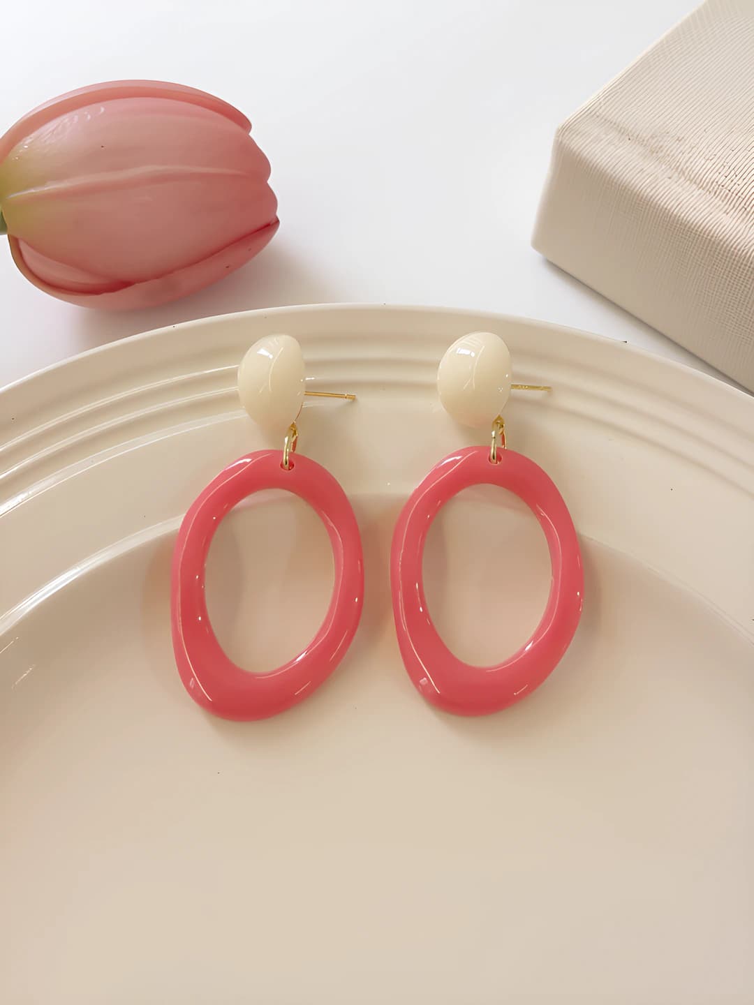 Rose red irregular cone stud earrings