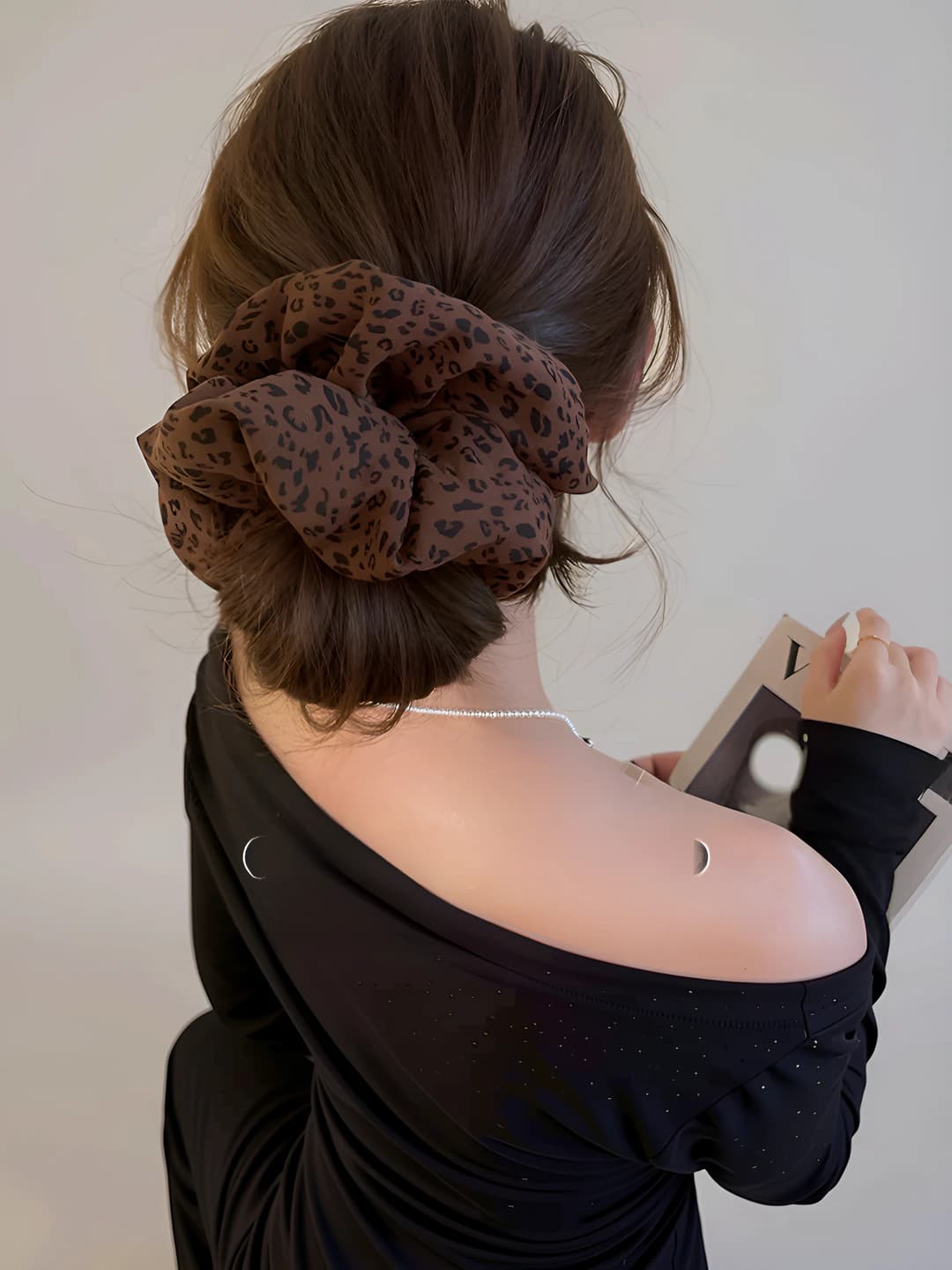 Dark leopard hair tie